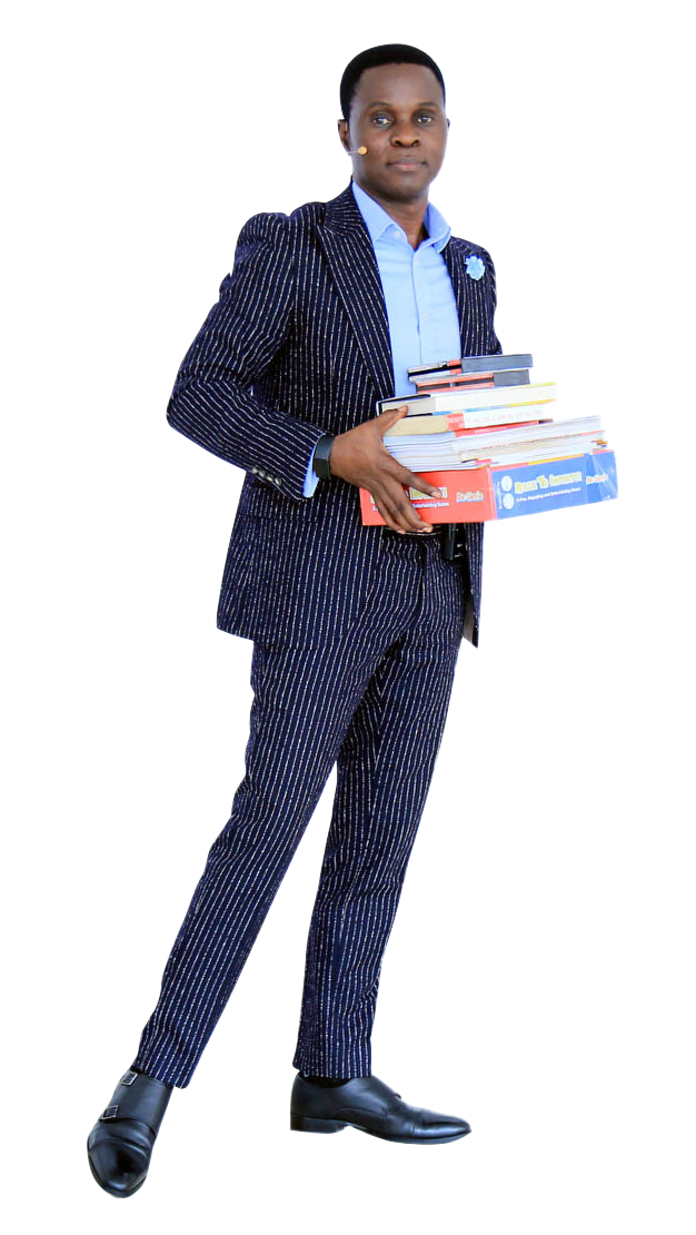 Author holding a stack of published books